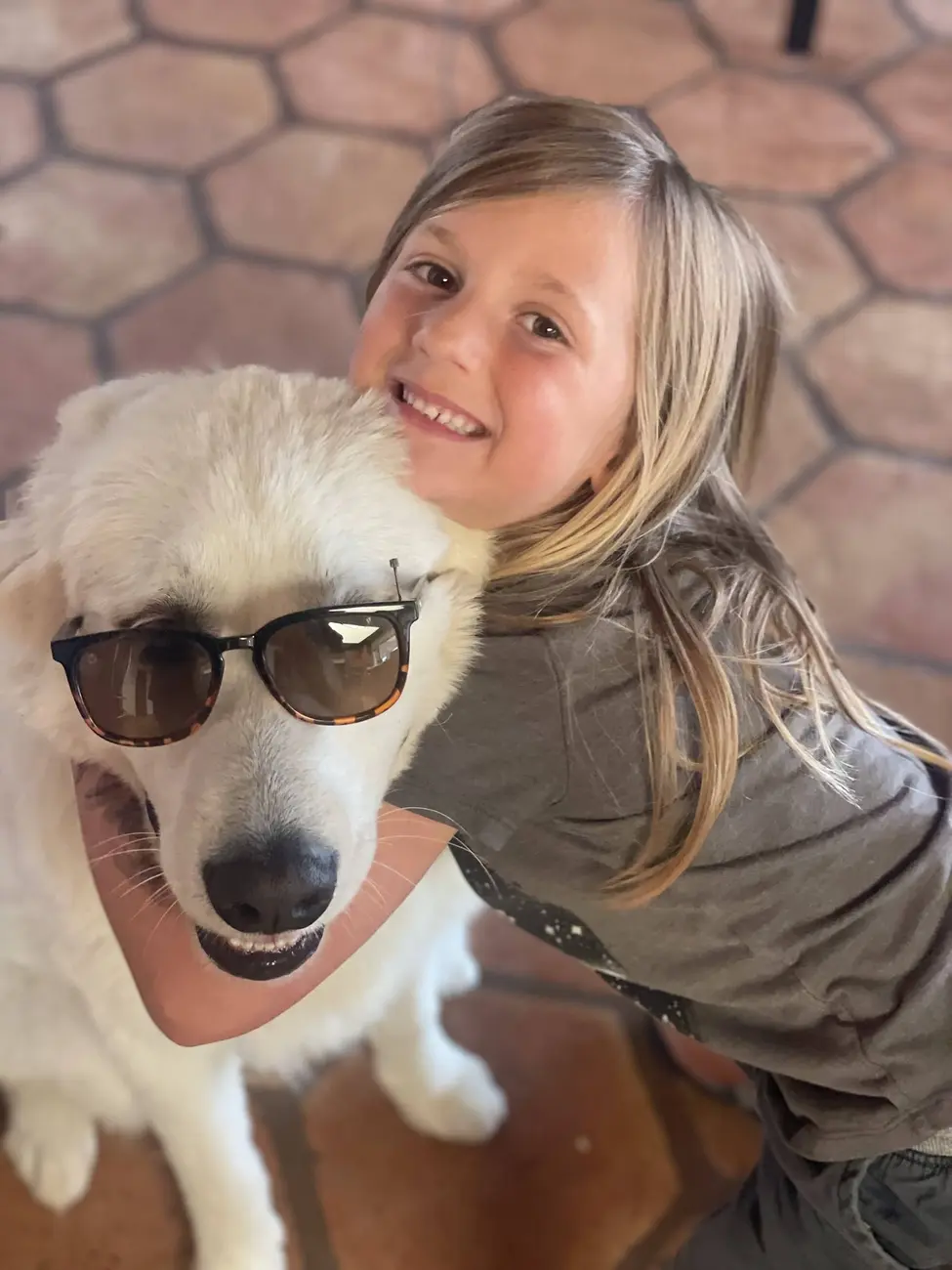 Kylo, the family’s Great Pyrenees, at Tradewinds Ranch